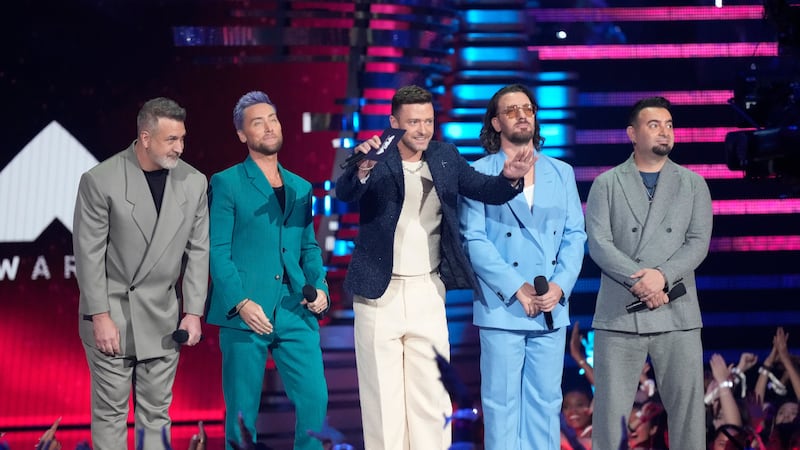 Joey Fatone, from left, Lance Bass, Justin Timberlake, JC Chasez and Chris Kirkpatrick of NSYNC present the award for best pop during the MTV Video Music Awards (Charles Sykes/Invision/AP)
