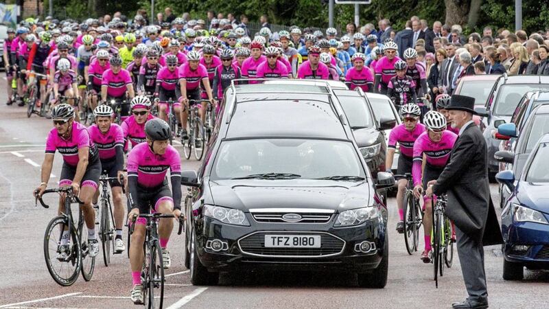 Hundreds of cyclists followed the coffin of Gavin Moore at his funeral in Bangor. Picture by Justin Kernoghan 