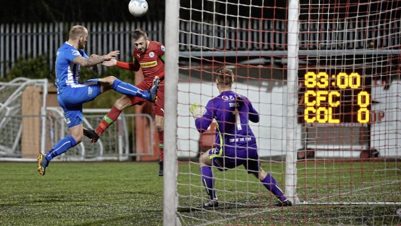 Cliftonville&#39;s Conor McMenamin scores the winner against Coleraine at Solitude on Saturday Picture by Colm Lenaghan/Pacemaker 