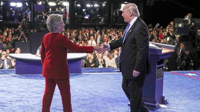Hillary Clinton shakes hands with Donald Trump during last year&#39;s US presidential campaign 