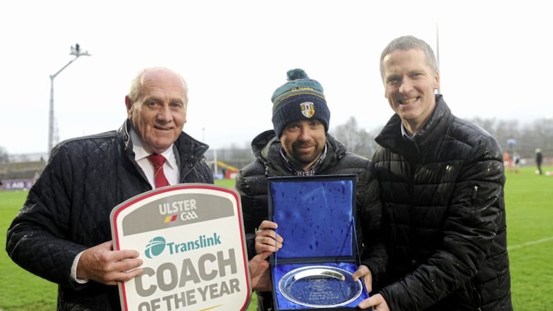 Ulster GAA vice-president Oliver Galligan with Translink Ulster GAA Coach of the Year winner P&aacute;draig Hall and Translink service delivery manager Sean Falls 