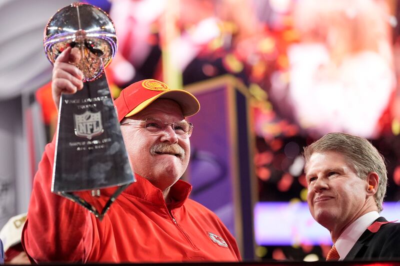 Kansas City Chiefs head coach Andy Reid holds the Vince Lombardi Trophy