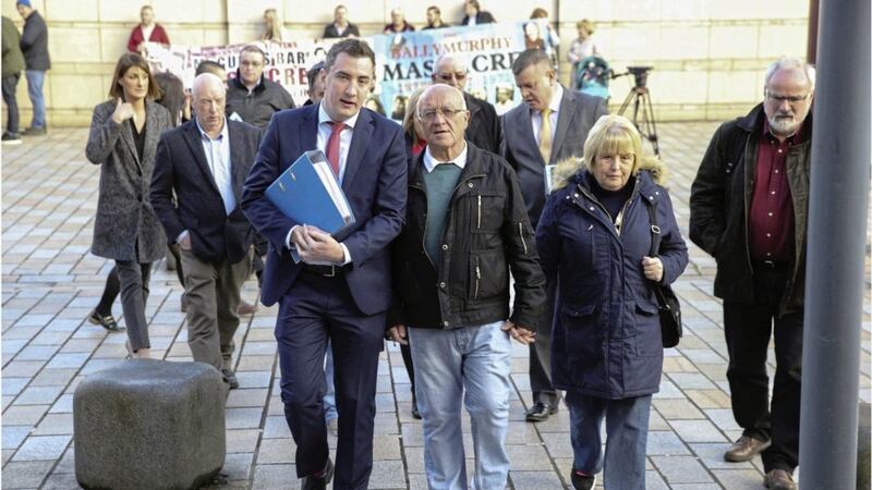 John McEvoy(front right) and his legal representative Gavin Booth make their way into the Hight Court. Picture by Hugh Russell