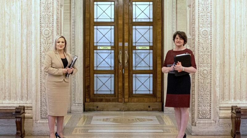 First minister Arlene Foster and Deputy First Minister Michelle O'Neill at Stormont before announcing the executive's coronavirus recovery plan. Picture by Liam McBurney, Press Association