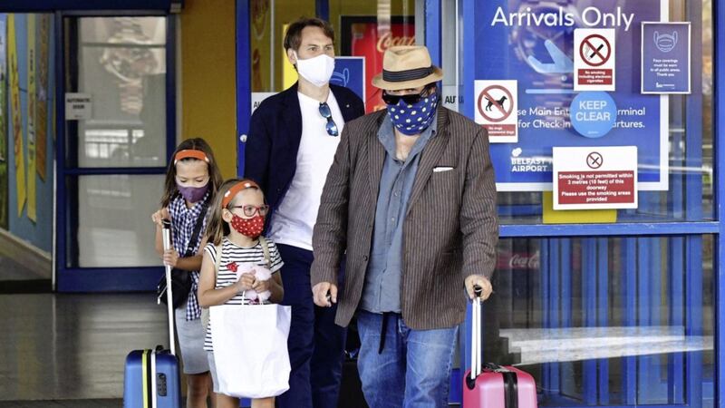 Passengers arriving from Alicante into Belfast International Airport on Sunday, after rules meaning people have to quarantine for 14 days were introduced. Picture by Alan Lewis/PhotopressBelfast.co.uk      