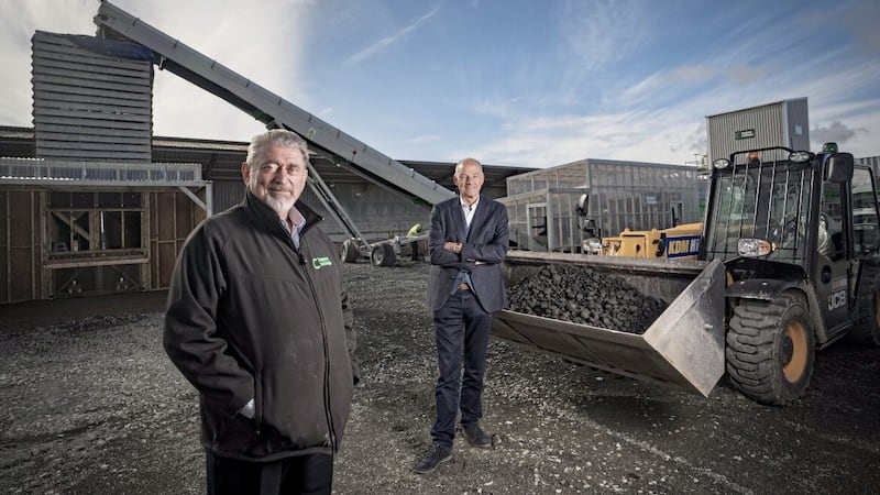 Mervyn McCall (right), chairman and investor at Changeover Technologies, with chief executive Ken Flockhart at its former test site in Ballygawley 