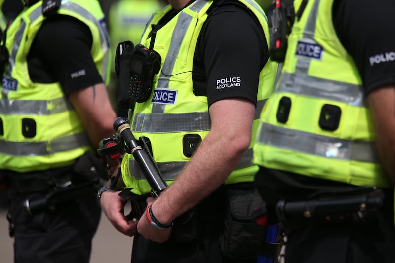 Man arrested after anti-immigration protest involving masked group in Glasgow