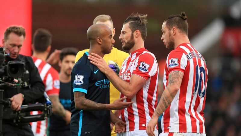 Tempers flare at the end of the game between Manchester City's Fabian Delph (left) and&nbsp;Stoke&nbsp;City's Marko Arnautovic (right) at the Britannia Stadium