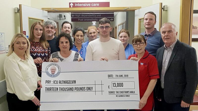 Family and friends of the late Martin McGuinness make a charity donation to the ICU at Altnagelvin  