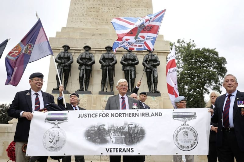 Former British soldier Dennis Hutchings (centre), who has been charged over the fatal 1974 shooting of a man in Northern Ireland, takes part in a protestin London to call for an end to prosecutions of veterans who served during the Troubles. Photo by Gareth Fuller/PA Wire  