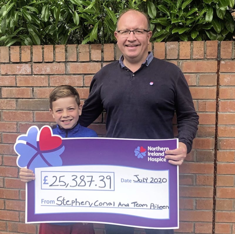 Stephen McGeown and his son Conal helped raise almost &pound;26,000 for the NI Hospice 