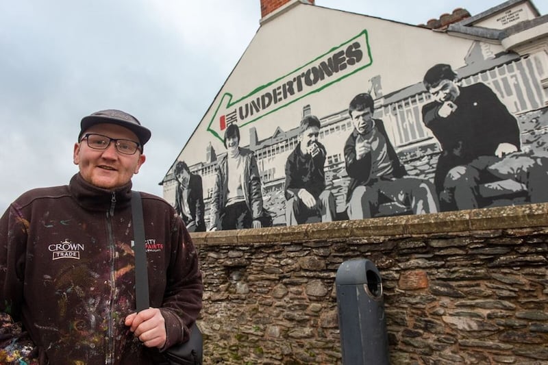 Artist Karl Porter with the new Undertones mural in Derry. Picture via @Feargal_Sharkey on X