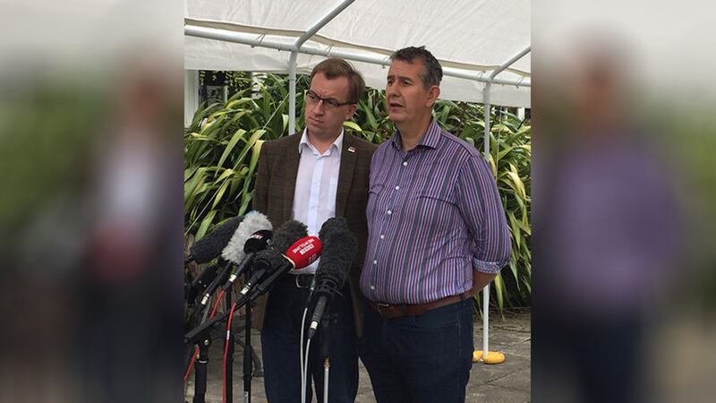 DUP's Edwin Poots (right) and Christopher Stalford speaking to the media at Stormont Castle, Belfast. Picture by David Young, PA Wire