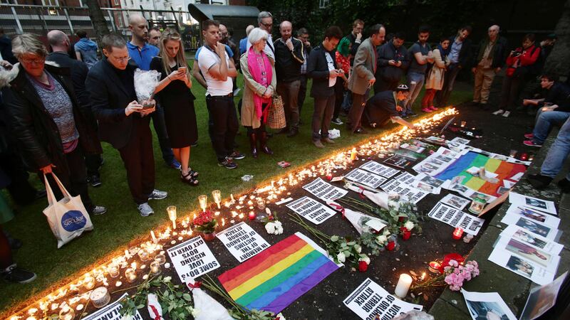 People laying candles and floral tributes at Saint Anne's Church in Soho, London, following a vigil for the victims of the Orlando Shootings at a Gay nightclub in Florida. Picture by&nbsp;Yui Mok, Press Association