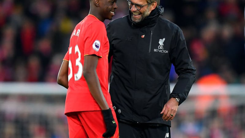 &nbsp;Liverpool manager Jurgen Klopp with Oviemuno Ejaria after the Premier League match at Anfield. Picture by PA