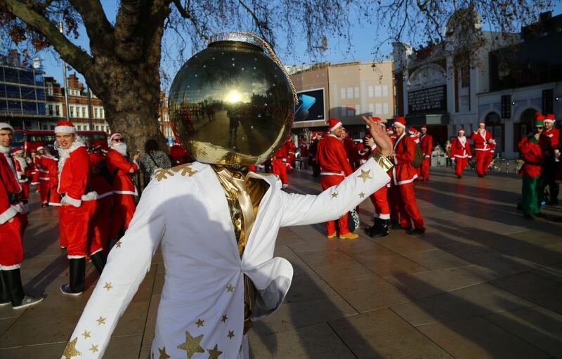 Man dressed as Christmas bauble