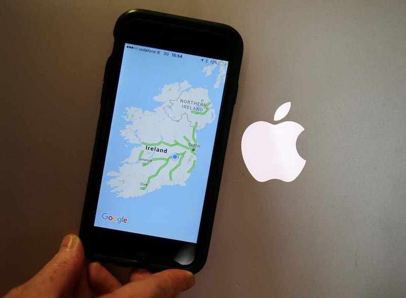 A map of Ireland beside the Apple logo (Niall Carson/PA)