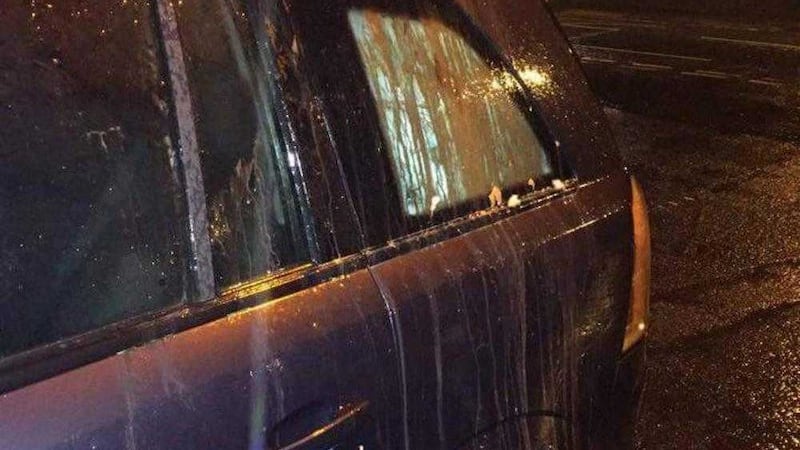 A car which was attacked with eggs and bottles on the Springfield Road by a group of youths on Saturday night. 