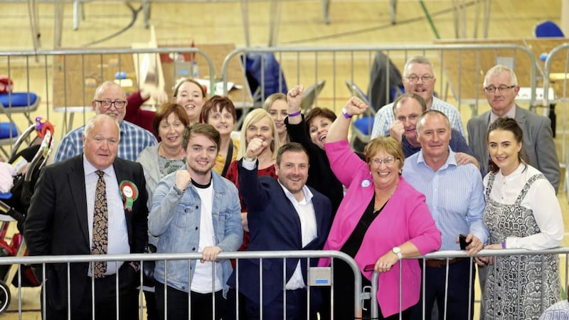 Cheering SDLP&#39;s gains in the Armagh Banbridge Council area are the party&#39;s Upper Bann MLA with newly-elected duo Thomas Larkham and Declan McAlinden. Photo: Mal McCann 