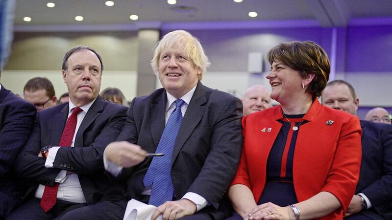Former cabinet minister Boris Johnson, with DUP leader Arlene Foster and deputy leader Nigel Dodds, was the guest speaker at the party&#39;s annual conference in Belfast on Saturday. Picture by Arthur Allison/Pacemaker Press 
