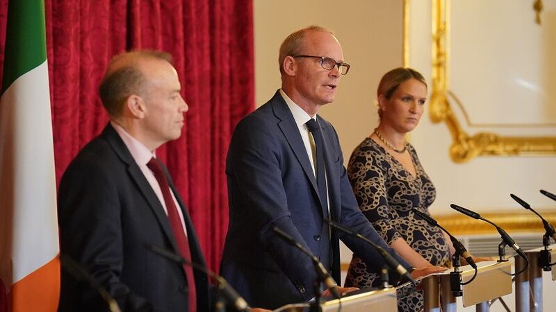 (left to right) the Secretary of State for Northern Ireland Chris Heaton-Harris, Irish Foreign Affairs Minister Simon Coveney and Minister for Justice Helen McEntee speaking during the British-Irish Intergovernmental Conference at Lancaster House in London. Picture by Jonathan Brady 