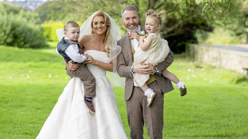 Twins Adam and Aoife with their mum Bronagh and dad Thomas Burke, who died suddenly in April aged 29 