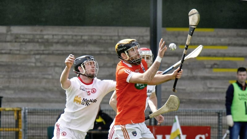 Tyrone&#39;s Bryan McGurk (left) in action against Armagh&#39;s Ciaran Clifford. 