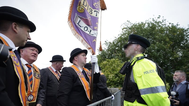 Police and Orangemen come face-to-face during yesterday's annual Drumcree parade in Portadown. It is 25 years since the parade was first prevented from returning along the mainly nationalist Garvaghy Road. Picture by Niall Carson/PA Wire