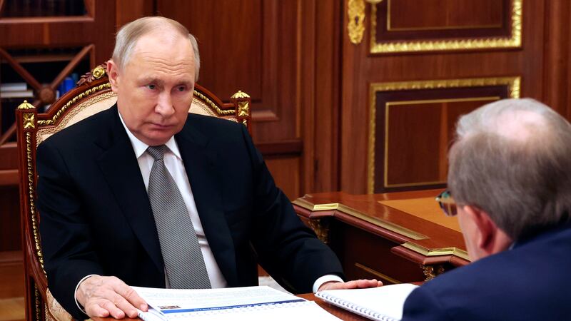 Russian President Vladimir Putin, left (Kremlin Pool Photo via AP)