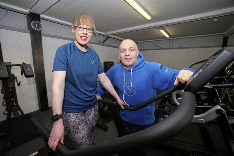 Emma Hamill with her trainer, former boxer Brian Magee, at his gym in west Belfast. Picture by Mal McCann 