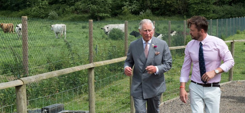The then-Prince of Wales with Jimmy Doherty during a visit to Jimmy’s Farm in Ipswich