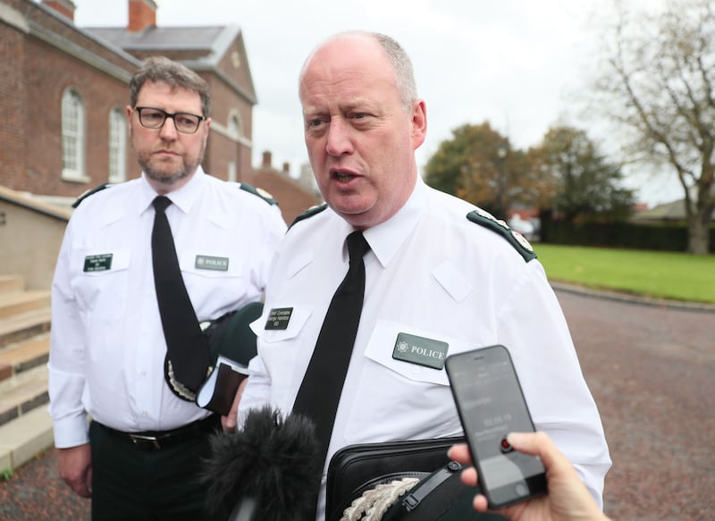 PSNI Chief Constable George Hamilton (right) and Assistant Chief Constable Stephen Martin leaving an Anti-Slavery Day event at Clifton House in Belfast, after it was announced that Mr Hamilton is facing an investigation into alleged misconduct in public office.&nbsp;&nbsp;Brian Lawless/PA Wire