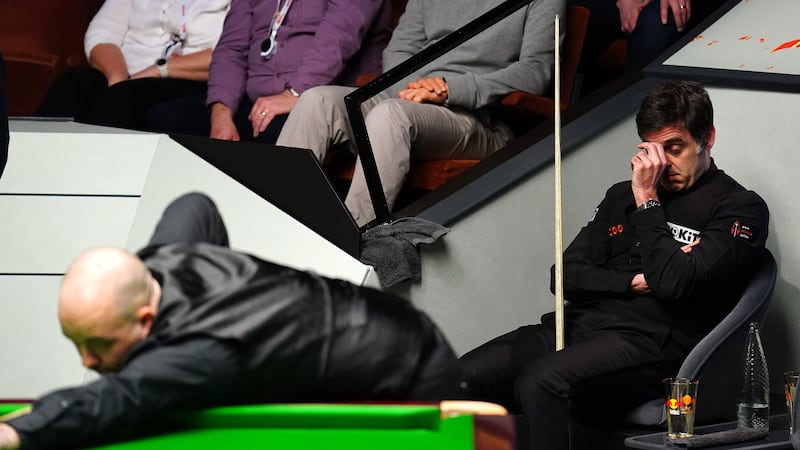 Ronnie O'Sullivan was confined to his chair as Luca Brecel won seven frames in a row to reach the semi-finals at the Crucible