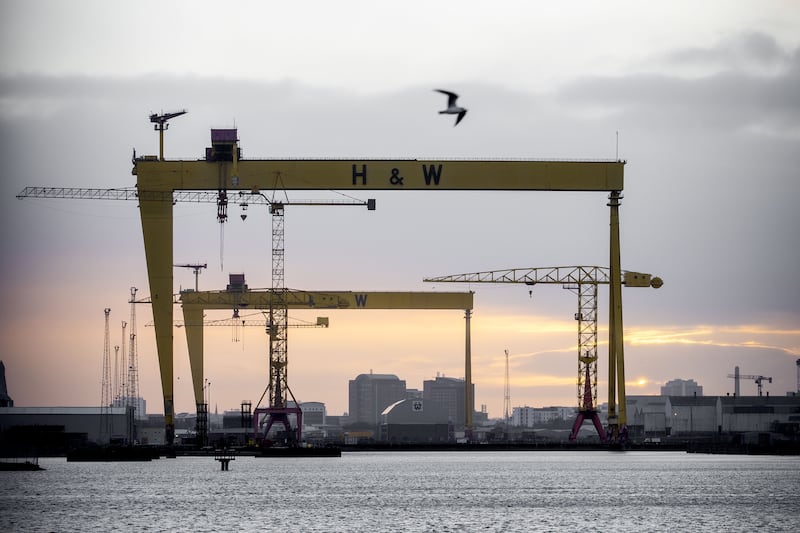 &nbsp;Sunset over the Harland and Wolff cranes in Belfast. Agreement has been reached on how to implement Northern Ireland aspects of Brexit involving borders and trade, the EU and UK said.