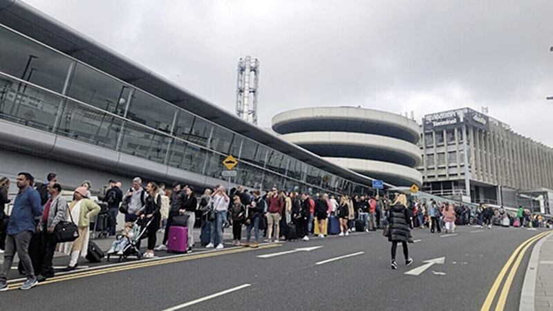 Lengthy queues outside Dublin Airport. Picture: RT&Eacute; 