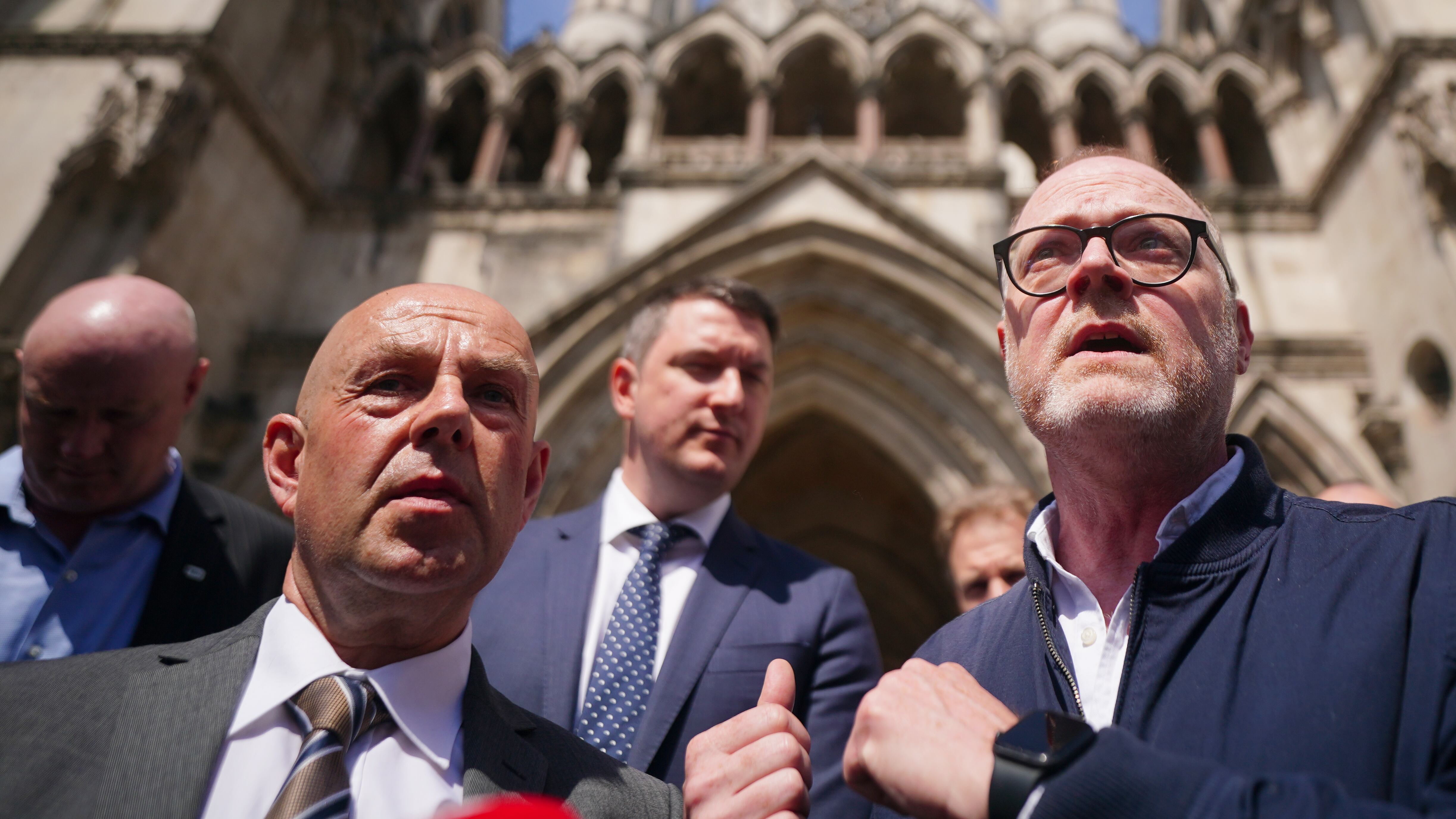Journalists Barry McCaffrey (left) and Trevor Birney (right) speaking to media after leaving the Royal Courts of Justice, in London, following an Investigatory Powers Tribunal (IPT) hearing over claims they were secretly monitored by police