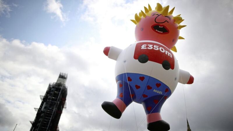 A blimp depicting Boris Johnson in Parliament Square for a pro-EU march 