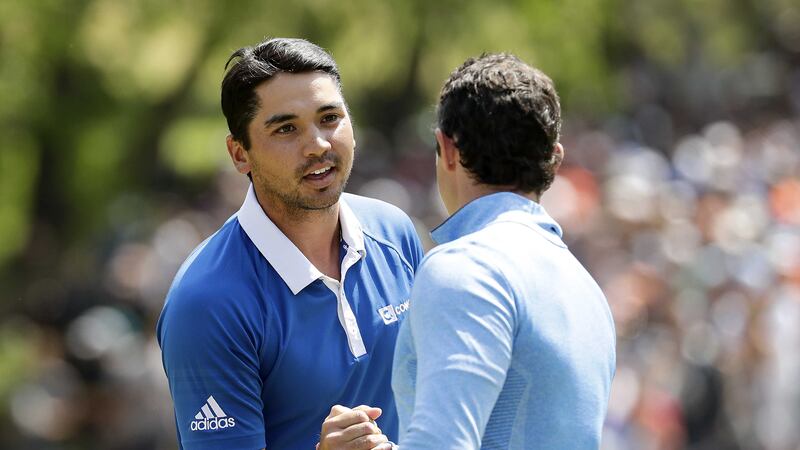 Jason Day shakes hands with Rory&nbsp;McIlroy&nbsp;after winning the semi-final round Dell Match Play Championship on Sunday