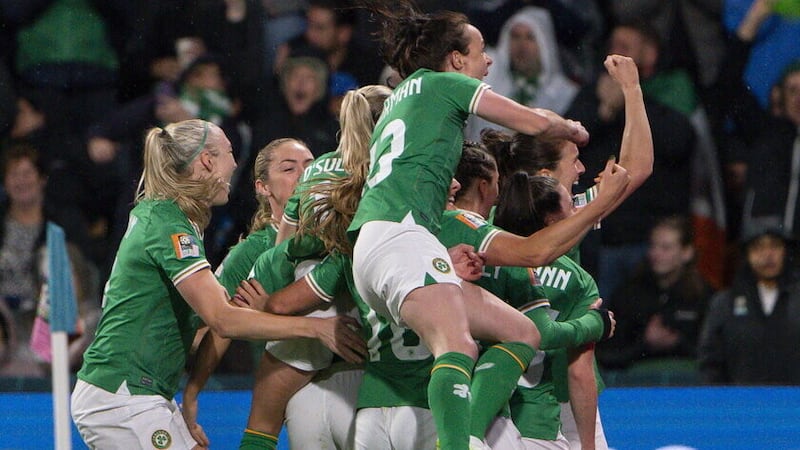 Republic of Ireland players celebrate Katie McCabe's goal against Canada in the match that saw them knocked out after eventually losing 2-1.