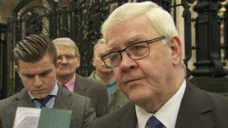 Francie McGuigan, one of the 'Hooded Men', speaks outside the High Court in Belfast. Picture from BBC