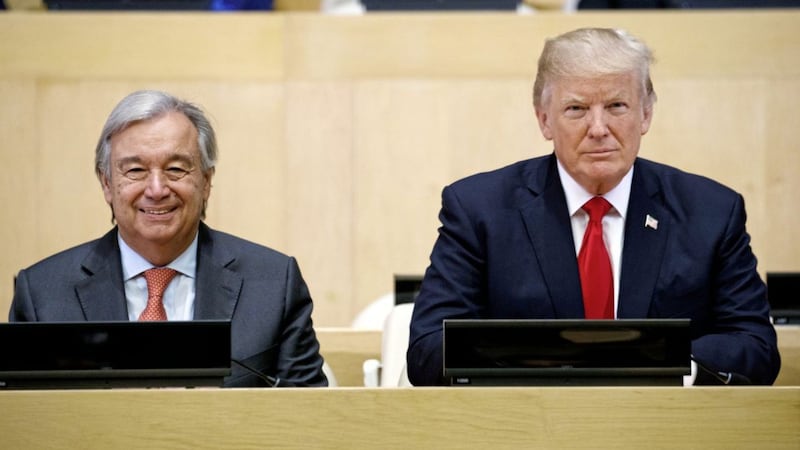 President Donald Trump sits with UN secretary general Antonio Guterres for a photo before the &quot;Reforming the United Nations: Management, Security, and Development&quot; meeting during the United Nations General Assembly, on Monday. Picture by Evan Vucci, Associated Press 