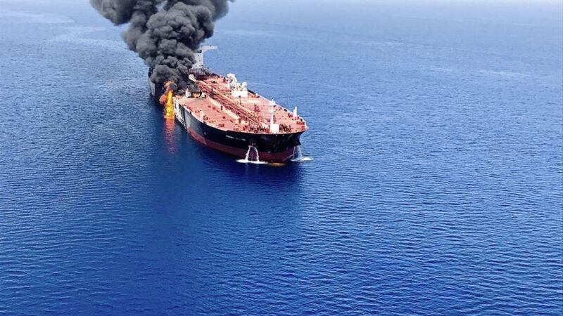 An oil tanker on fire near the Strait of Hormuz on Thursday. Picture by ISNA/AP 