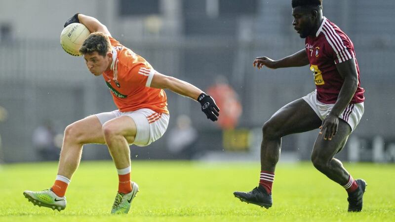 9 June 2018; Patrick Burns of Armagh in action against Boidu Sayeh of Westmeath during the GAA Football All-Ireland Senior Championship Round 1 match between Westmeath and Armagh at TEG Cusack Park in Mullingar, Co. Westmeath. Photo by Ramsey Cardy/Sportsfile 