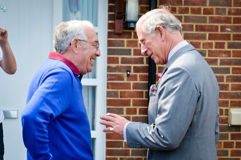The Prince of Wales meets Richard Kerslake during a visit to the Mildren Homes development on Duchy of Cornwall land in Fordington, Dorset. Ben Birchall/PA Wire