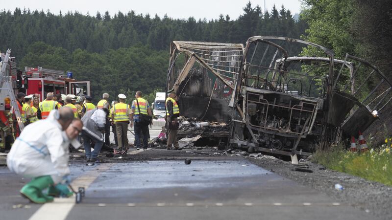 At least 18 are feared dead after the bus burst into flames.