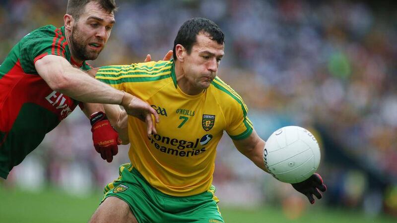 Donegal's Frank McGlynn gets the ball away from Mayo's Tom Boyle during last Saturday's game in Dublin <br />Picture: Hugh Russell
