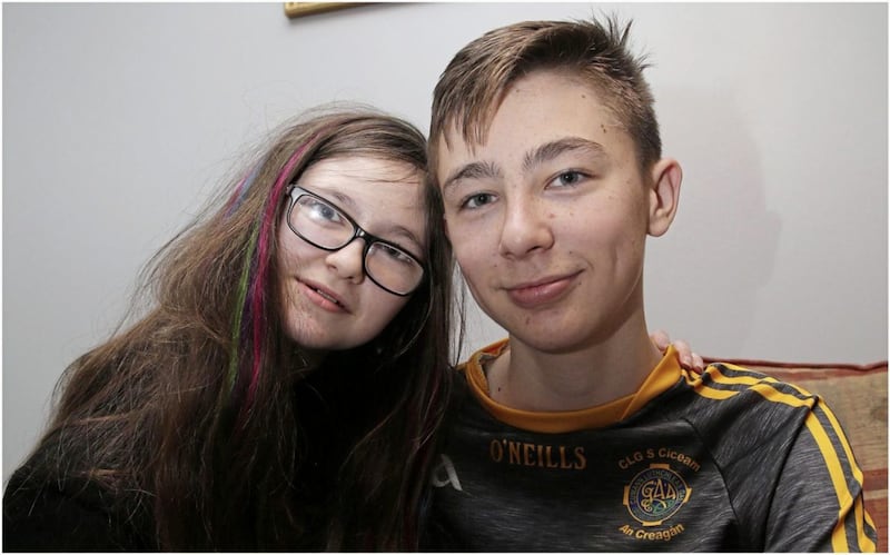Mary O&#39;Neill pictured with her brother, Fintan, one year after the pair suffered a catalogue of injuries when they were knocked down by a car getting off a school bus in Co Antrim. Picture by Hugh Russell. 