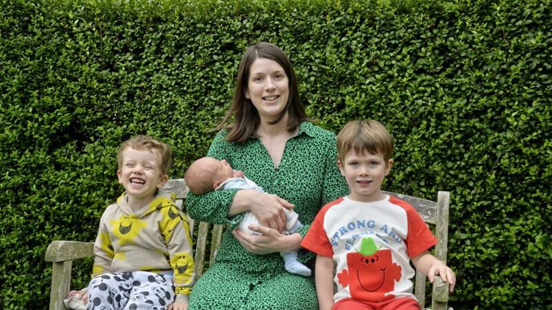 Medbh Hillyard at home with her children Finn, baby Rowan and Rory. Picture Mark Marlow