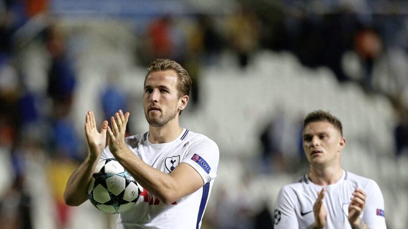 Tottenham&#39;s Harry Kane, who score three goals against APOEL holds the ball at the end of the Champions League Group H soccer match between APOEL Nicosia and Tottenham Hotspur at GSP stadium, in Nicosia, Cyprus, on Tuesday, Sept. 26, 2017. Tottenham won 3-0.(AP Photo/Petros Karadjias). 