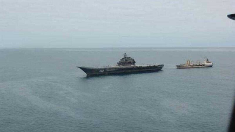 In this undated handout picture released by the Irish Department of Transport oil can be seen floating on the surface of the Celtic Sea close to where the Russian aircraft carrier Admiral Kuznetsov was refuelling. PRESS ASSOCIATION Photo. Issue date: Tuesday February 17 2009. The other vessell near the 1 000 fot-long carrier is an oil tanker. See PA story IRISH Oil. Mandatory credit should read: Department of Transport / PA Wire. 